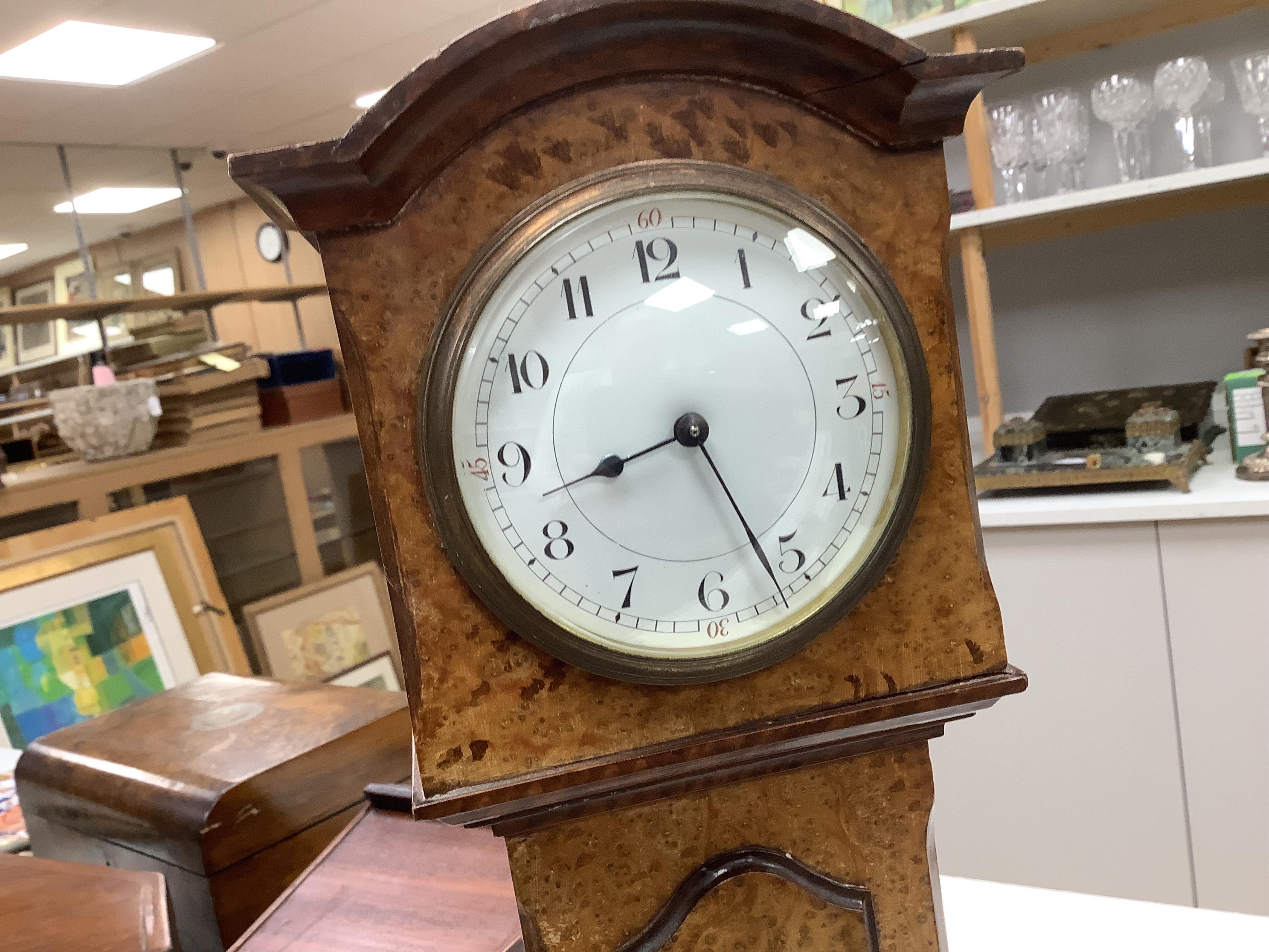 A small French amboyna model of a longcase timepiece, with key, 44cm high